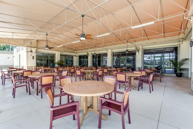 dining area featuring a ceiling fan and a wealth of natural light