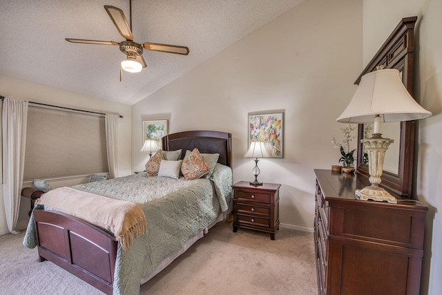 6275 SE Charleston Pl Unit B203, Hobe Sound, FL 33455 - bedroom featuring light colored carpet, baseboards, a textured ceiling, a ceiling fan, and high vaulted ceiling
