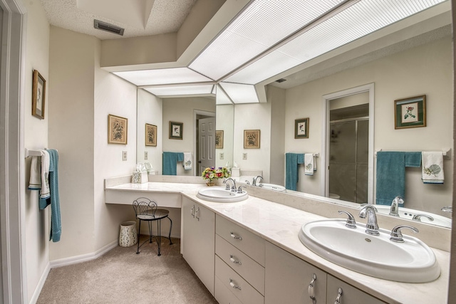 6275 SE Charleston Pl Unit B203, Hobe Sound, FL 33455 - full bathroom with a shower stall, double vanity, and baseboards