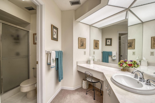 6275 SE Charleston Pl Unit B203, Hobe Sound, FL 33455 - bathroom featuring a shower stall, vanity, toilet, and baseboards