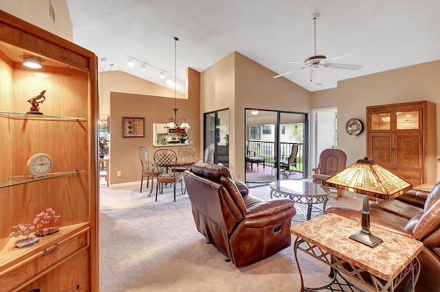 living room featuring visible vents, light colored carpet, lofted ceiling, ceiling fan, and track lighting