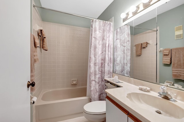 bathroom with toilet, shower / bath combo, visible vents, and vanity