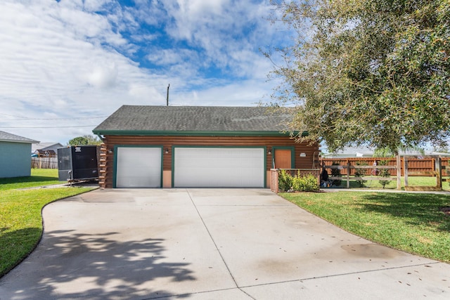 view of front of home with a garage, concrete driveway, log siding, and fence