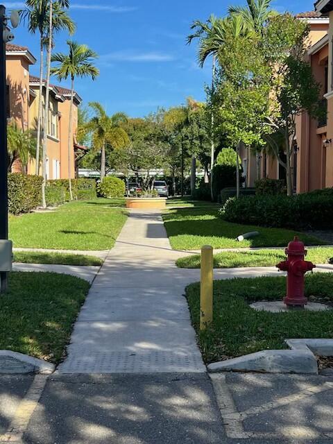 view of community with a yard