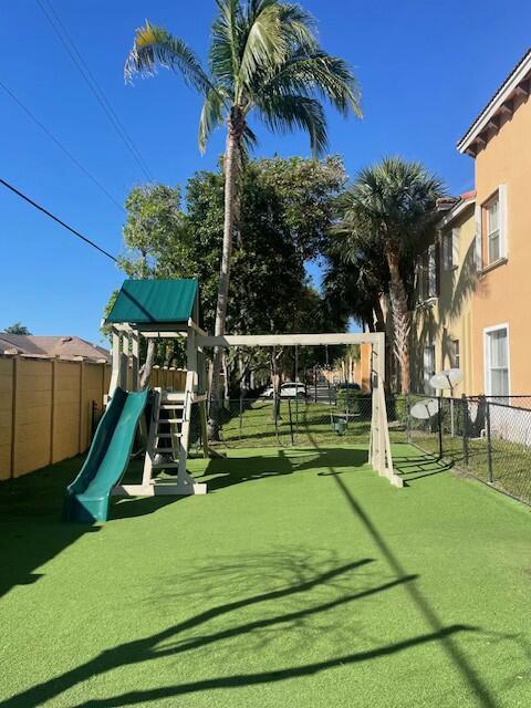 view of play area with fence