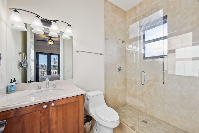 ensuite bathroom featuring ensuite bath, a shower stall, toilet, and vanity