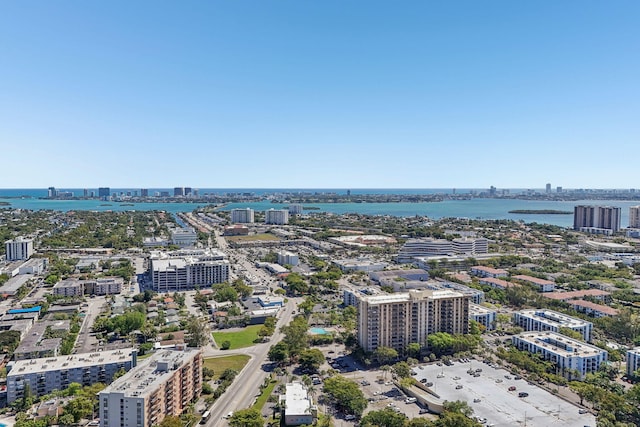 bird's eye view featuring a view of city and a water view