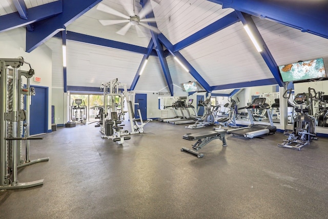 exercise room with high vaulted ceiling and a ceiling fan