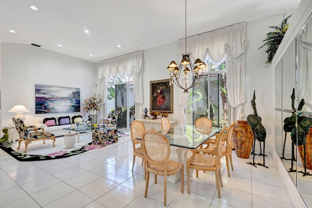 dining space featuring light tile patterned floors, recessed lighting, and an inviting chandelier