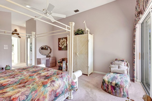 bedroom with light carpet, baseboards, visible vents, a ceiling fan, and lofted ceiling