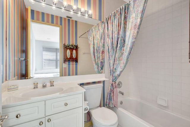 full bathroom featuring shower / bath combo, vanity, toilet, and wallpapered walls