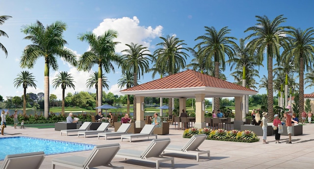 community pool featuring a patio and a gazebo