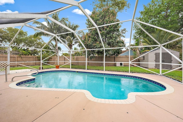 view of pool with an outbuilding, a patio, a fenced backyard, a fenced in pool, and a storage unit