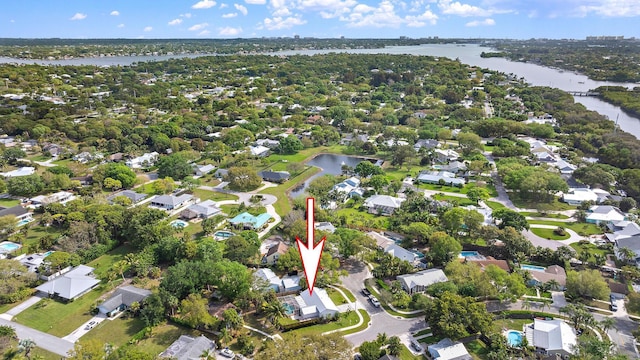 bird's eye view featuring a residential view and a water view