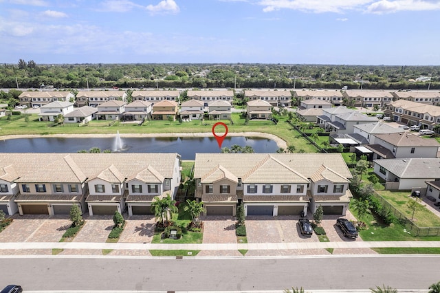 aerial view with a residential view and a water view