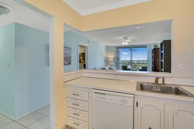 kitchen featuring a sink, open floor plan, white dishwasher, light countertops, and light tile patterned floors