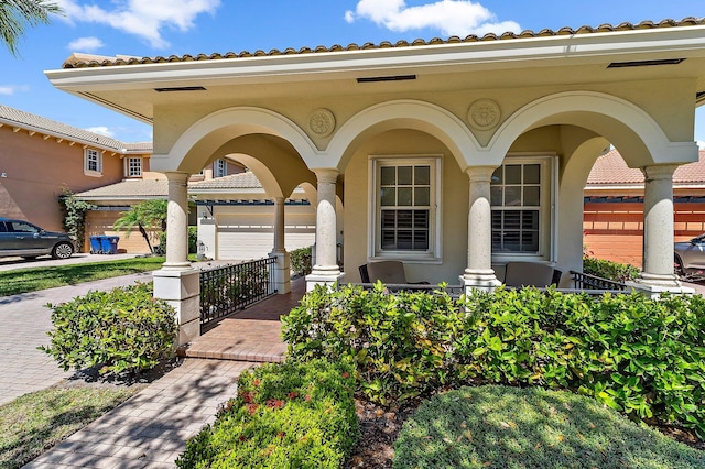 view of front of home with covered porch and stucco siding