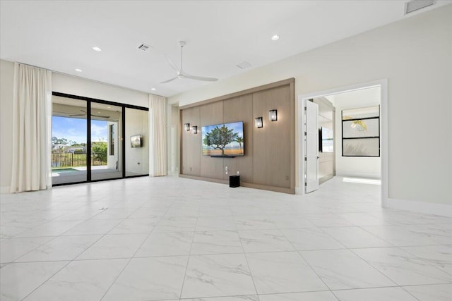 empty room featuring ceiling fan, marble finish floor, baseboards, and recessed lighting