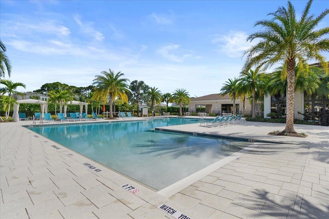 pool featuring a patio area