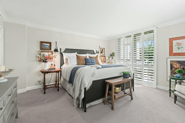 bedroom with crown molding, light colored carpet, and baseboards