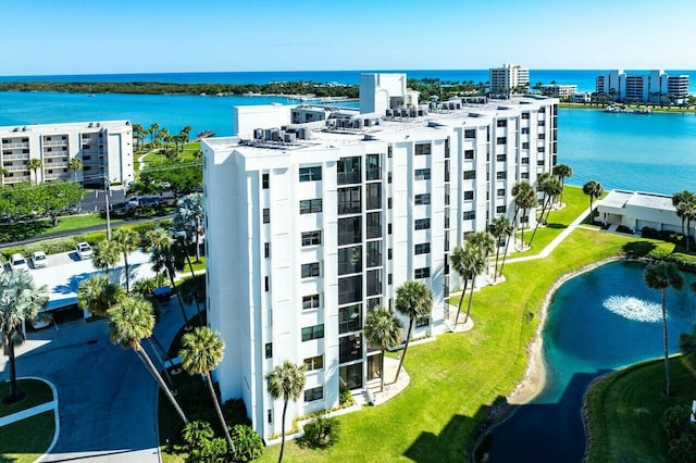 aerial view featuring a water view and a view of city