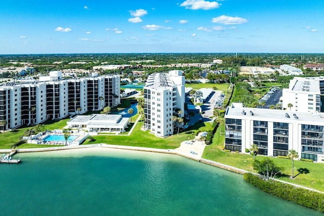 drone / aerial view with a view of city and a water view