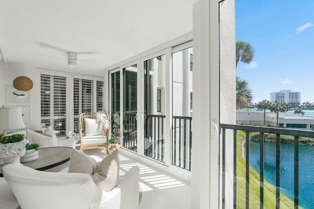 balcony featuring a ceiling fan