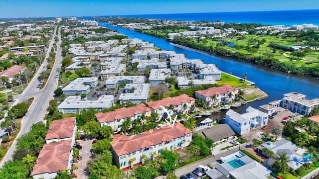 aerial view featuring a water view and a residential view