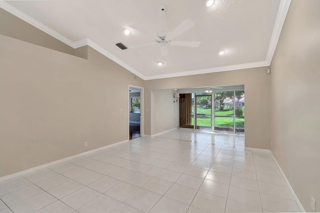 unfurnished room featuring vaulted ceiling, light tile patterned floors, visible vents, and ornamental molding