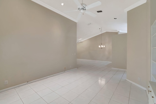 spare room featuring light tile patterned floors, vaulted ceiling, crown molding, and ceiling fan with notable chandelier