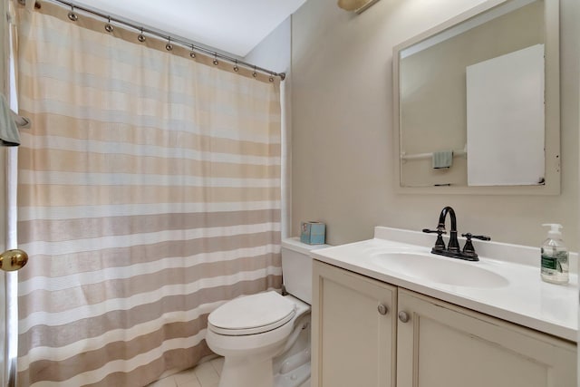 bathroom with vanity, toilet, a shower with curtain, and tile patterned flooring