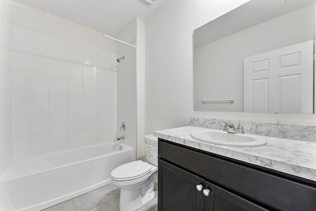 full bath with tile patterned flooring, shower / washtub combination, toilet, and vanity