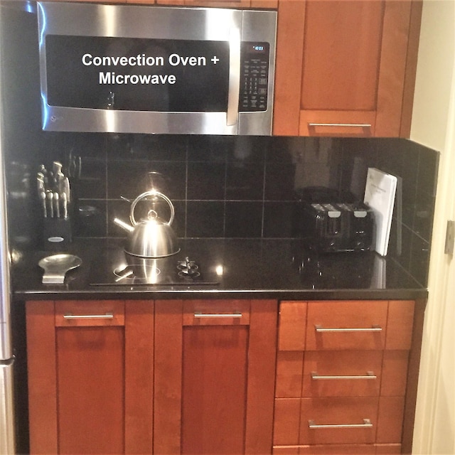 interior space featuring decorative backsplash and brown cabinetry