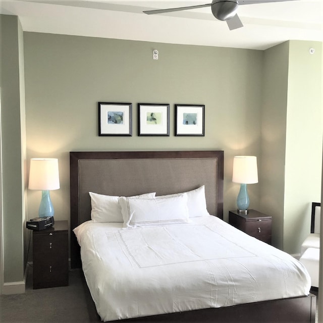 bedroom with carpet floors and a ceiling fan