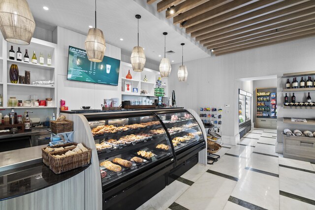 interior space featuring visible vents, recessed lighting, and pendant lighting