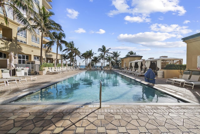 community pool with a patio