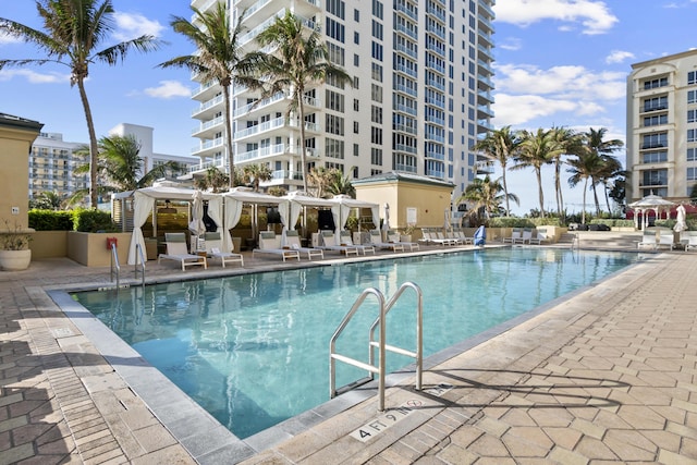 community pool with a patio