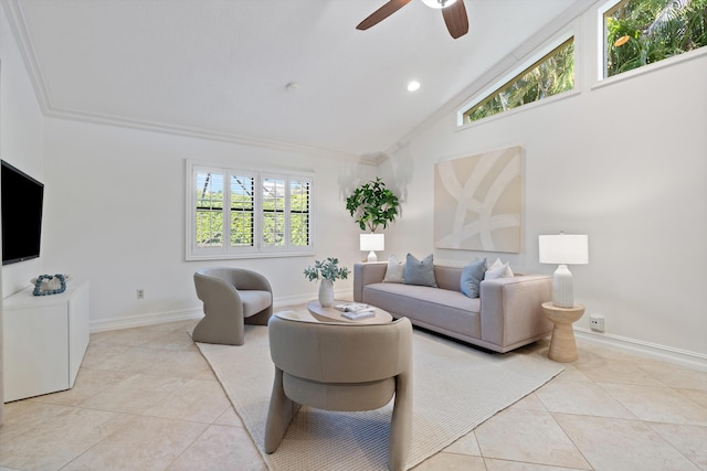 living room with lofted ceiling, a ceiling fan, crown molding, light tile patterned floors, and baseboards