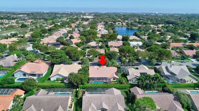aerial view with a residential view and a water view