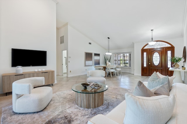 living room with visible vents, high vaulted ceiling, crown molding, light tile patterned floors, and baseboards
