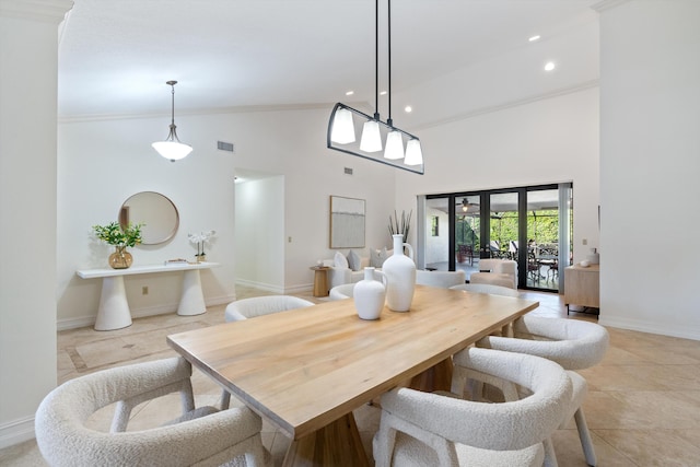 dining area with recessed lighting, baseboards, visible vents, and high vaulted ceiling