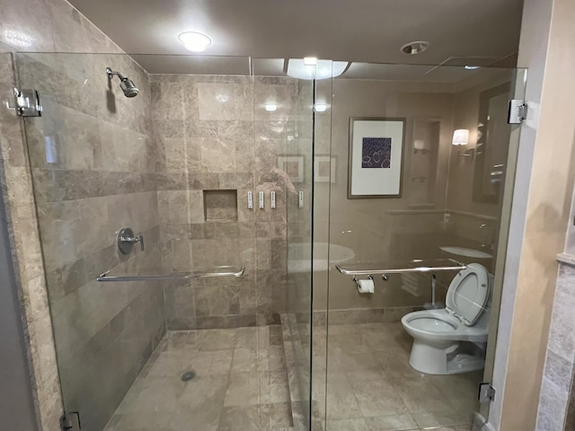 full bath with a shower stall and toilet