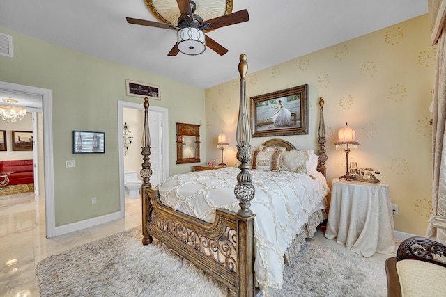 bedroom featuring light tile patterned floors, visible vents, baseboards, a ceiling fan, and connected bathroom