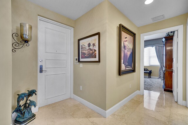 entryway featuring visible vents and baseboards