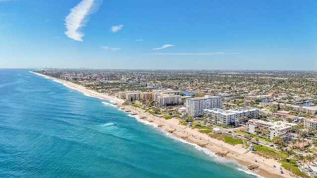 bird's eye view featuring a view of city, a water view, and a view of the beach