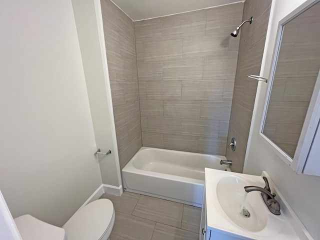 full bathroom featuring shower / bathtub combination, toilet, vanity, baseboards, and tile patterned floors