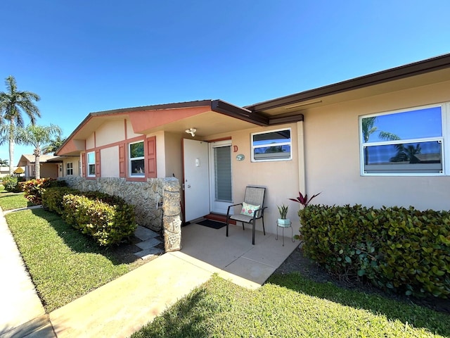 view of front of house with stucco siding