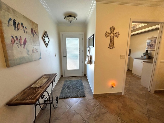 doorway featuring tile patterned flooring, crown molding, and baseboards