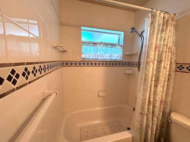 full bath with toilet and shower / tub combo