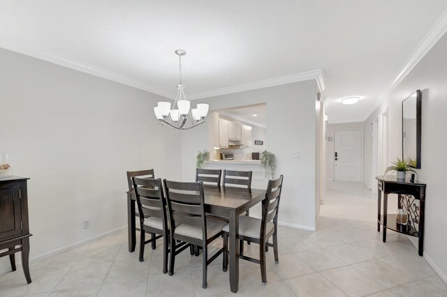 dining room featuring baseboards, an inviting chandelier, light tile patterned flooring, and crown molding